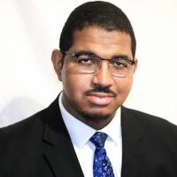 Headshot of Christopher Travis, MD, MS